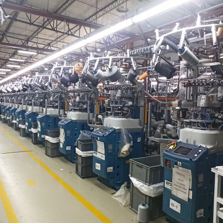 Machine tools on a production floor; on-site view outside the laboratory.